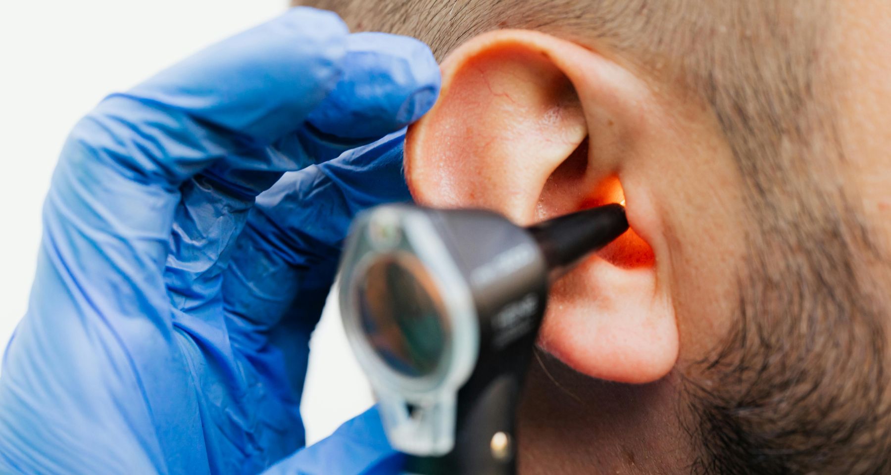 A patient having an ear examination. 