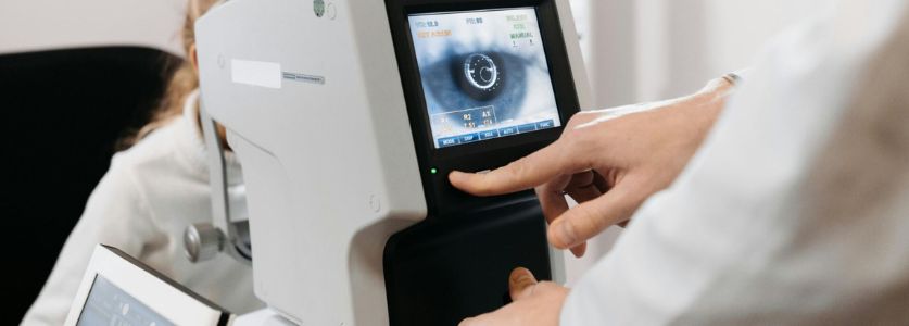 A doctor doing an eye examination.